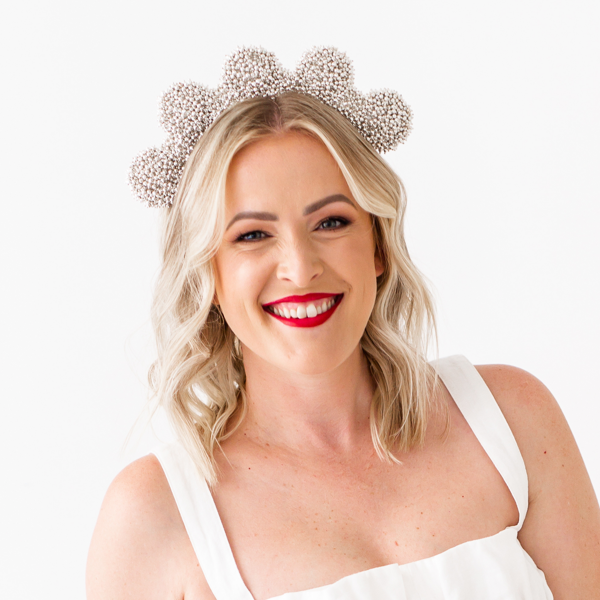 Silver Francesca crown modelled on a blonde female with  a white background